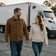 Derek and Amanda, a Georgia couple who found love on MileDating trucker dating, walking toward a semi-truck