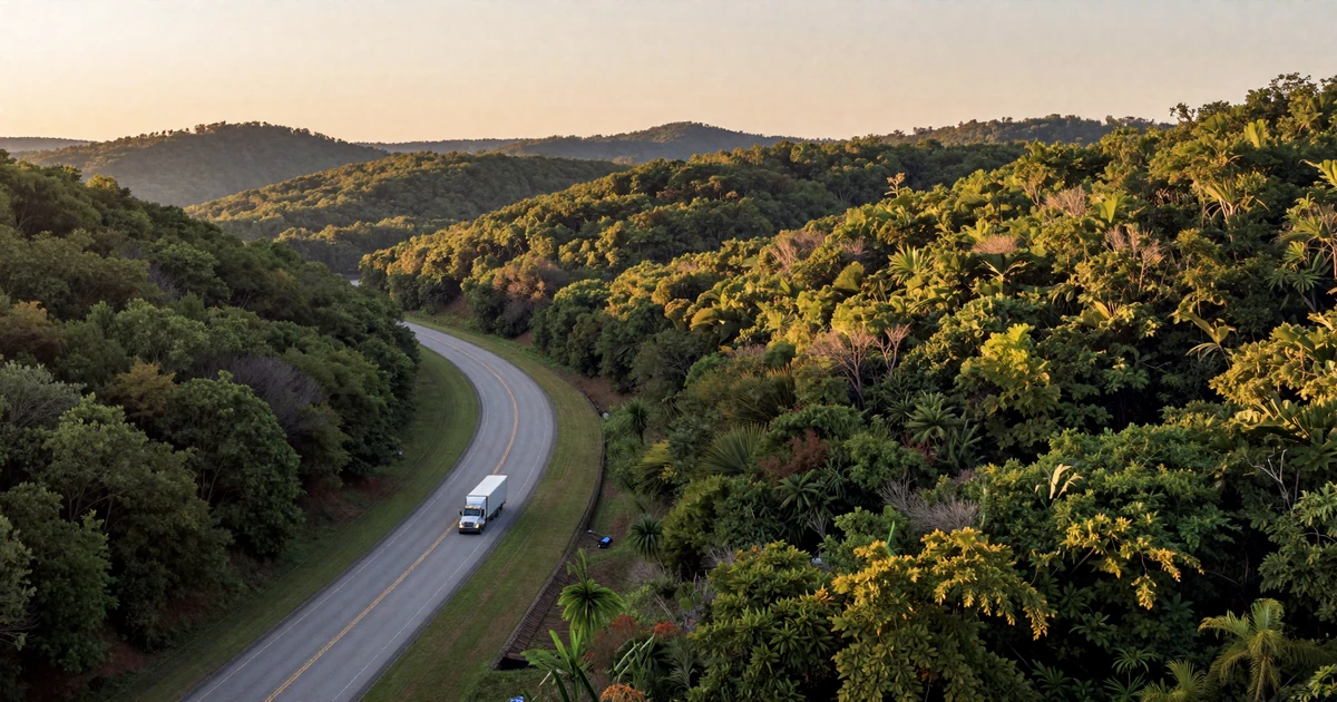 Interstate 40 winding through the Ozark Mountains in Arkansas at sunset, representing trucker dating in Arkansas
