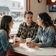 Marcus and Danielle, a Houston couple who met through MileDating trucker dating, sharing coffee at a diner counter